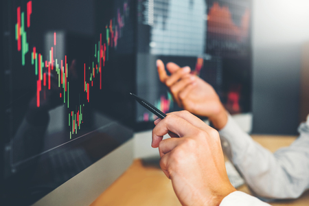 Business Team Investment Entrepreneur Trading discussing and analysis graph stock market trading,stock chart conceptの写真素材