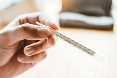 Doctor holding on thermometer for checking sick patient Health care in hospital