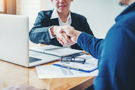 Business people colleagues shaking hands meeting Planning Strategy Analysis Conceptの写真素材