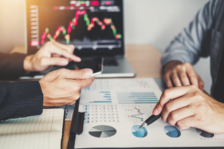 Business Team Investment Entrepreneur Trading discussing and analysis graph stock market trading,stock chart conceptの写真素材