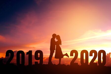 2020 Newyear Silhouette young couple Happy for  romantic new year concept.の写真素材