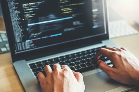 Developing programmer Development Website design and coding technologies working in software company officeの写真素材