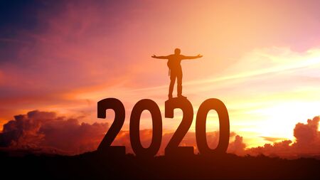 2020 New year Silhouette young man Freedom and Happy new year conceptの写真素材