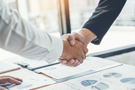 Business people colleagues shaking hands meeting Planning Strategy Analysis Conceptの写真素材