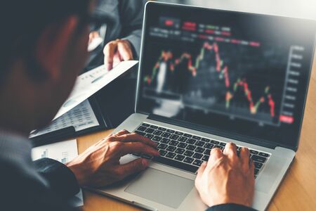 Business Team Investment Entrepreneur Trading discussing and analysis graph stock market trading,stock chart conceptの写真素材