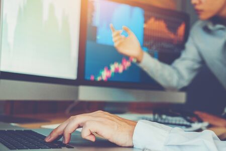 Business Team Investment Entrepreneur Trading discussing and analysis graph stock market trading,stock chart conceptの写真素材