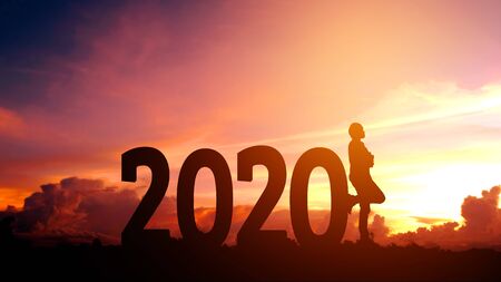 2020 New year Silhouette young man Freedom and Happy new year conceptの写真素材
