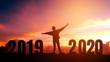 2020 New year Silhouette young man Freedom and Happy new year conceptの写真素材