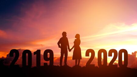 2020 Newyear Silhouette young couple Happy for  romantic new year concept.の写真素材