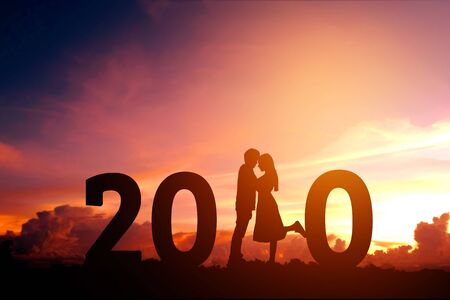 2020 Newyear Silhouette young couple Happy for  romantic new year concept.の写真素材