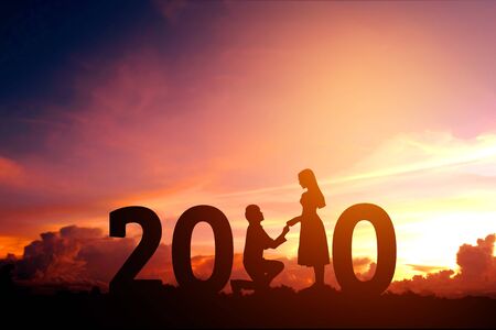 2020 Newyear Silhouette young couple Happy for  romantic new year concept.の写真素材