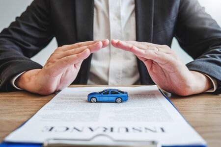 Sale agent protection Car insurance and collision damage conceptの写真素材