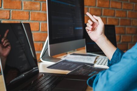 Developing programmer Development Website design and coding technologies working in software company office stockの写真素材