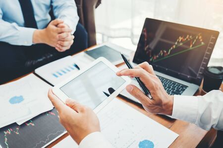 Business Team Investment Entrepreneur Trading discussing and analysis graph stock market trading,stock chart conceptの写真素材