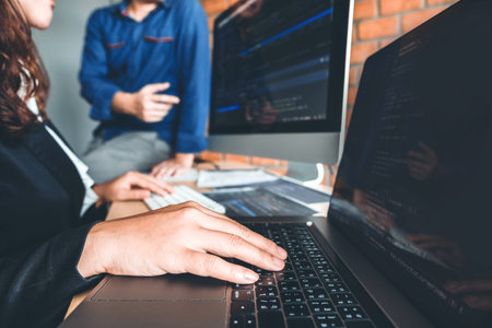 Developing programmer Team Development Website design and coding technologies working in software...