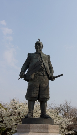 Statue of Toyotomi Hideyoshi  in Hokoku Jinja shrine near Osaka castle during cherry blossom  Osaka, Japan のeditorial素材
