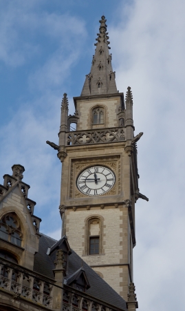Clock tower of the old building of former post office (Oude Postkantoor, circa 1910). Ghent, East Flanders, Belgiumのeditorial素材