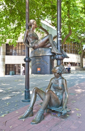 Female sculptures integrated with a mail box  Bratislava, Slovakiaの写真素材