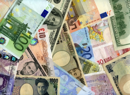 Hard currency banknotes background  US dollar, Euro, Japanese yen, UK pound の写真素材