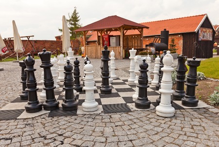 Giant chess figures at the yard of medieval Mewe castle in Gniew town, Poland のeditorial素材