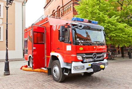 Torun, Poland - May 06, 2014  Fire-fighting vehicle Mercedes at Fire Service Day celebration on square Rynek Staromiejski  in Torun, Poland のeditorial素材