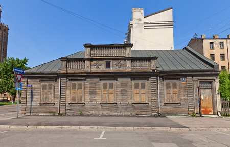 Riga, Latvia - May 25, 2014  Old residential house with wooden facade  circa XIX c   on Elijas street in Riga, Latviaのeditorial素材