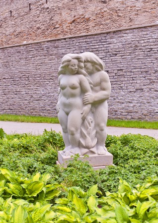 Tallinn, Estonia - May 27, 2014  White marble sculpture of nude woman and man  circa 2008   Sculptor E  Kolk  Superintendent garden  Komandandi aed , historical center of Tallinn, Estonia  UNESCO site のeditorial素材