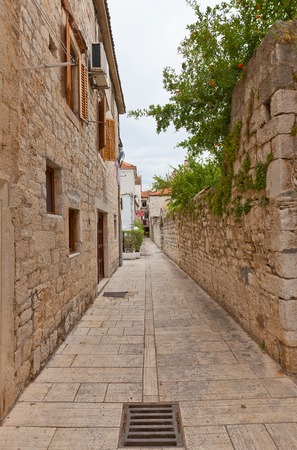Trogir, Croatia - June 15, 2014  Narrow street with medieval houses in the historical center of Trogir, Croatia  World Heritage site of UNESCO のeditorial素材