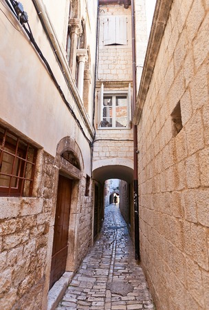 Trogir, Croatia - July 20, 2014  Narrow street with medieval houses in the historical center of Trogir, Croatia  World Heritage site of UNESCO のeditorial素材