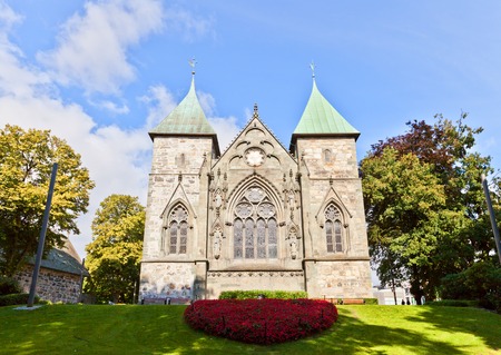 STAVANGER, NORWAY - AUGUST 16, 2014: East facade of Stavanger Cathedral (Stavanger domkirke, circa XIII c.). The oldest cathedral in Norway, city landmark of Stavangerのeditorial素材
