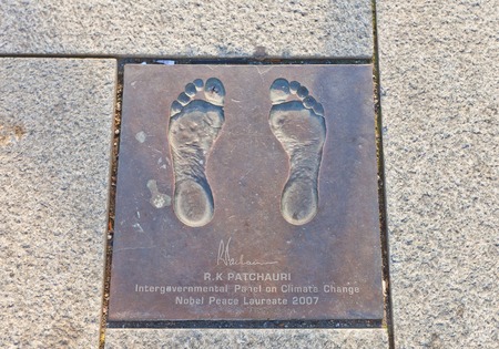 STAVANGER, NORWAY - AUGUST 16, 2014: Bronze cast of bare feet of Rajendra Kumar Pachauri, Nobel Peace laureate in Stavanger, Norway. Part of Path of Peace, the project of human rights foundation Point of Peaceのeditorial素材