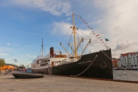 STAVANGER, NORWAY - AUGUST 16, 2014: MV Rogaland (IMO number 5298652) at the waterfront of Stavanger, Norway. Constructed in 1929, now operates as a museum ship and occasionally offers sailings on the fjordsのeditorial素材