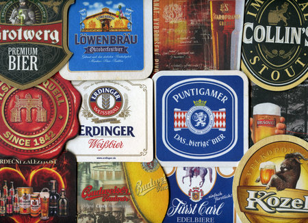 Beermats (bierdeckel) background. Various beer trademarks のeditorial素材