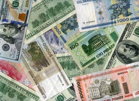 US dollars and Belarus banknotes (rubles) backgroundの写真素材
