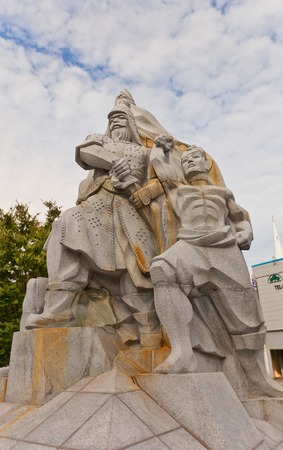BUSAN, KOREA - SEPTEMBER 25, 2014: Stone statue (circa 1981) of Korean patriot general Yun Heung-Shin in Busan, Korea. Naval officer Heung-Shin died with honor during the battle against Japanese invaders (Imjin War 1592-1598)のeditorial素材