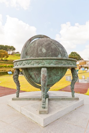 BUSAN, SOUTH KOREA - SEPTEMBER 25, 2014:  Celestial globe Honsang in Science Garden of Dongnae castle in Busan, Korea. Garden commemorates the achievements of Jang Yeong-sil, a Korean astronomer of XIV c.のeditorial素材