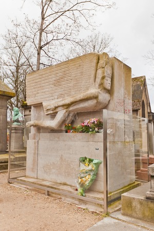 PARIS, FRANCE - FEBRUARY 21, 2015: Grave of Oscar Fingal OFlahertie Wills Wilde on Pere Lachaise Cemetery in Paris. Oscar Wild (1854-1900) was a an Irish writer and poet, author of novel The Picture of Dorian Grayのeditorial素材