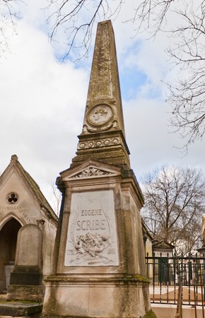 PARIS, FRANCE - FEBRUARY 21, 2015: Tomb of Augustin Eugene Scribe on Pere Lachaise Cemetery in Paris. Eugene Scribe (1791-1861) was a French dramatist and librettist of many of the most successful grand operasのeditorial素材