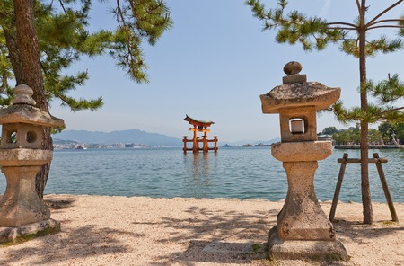 ITSUKUSHIMA JAPAN  MAY 20 2015:  World famous floating torii gate of Itsukushima Shinto Shrine Miyajima Island Japan. World Heritage site of UNESCOのeditorial素材