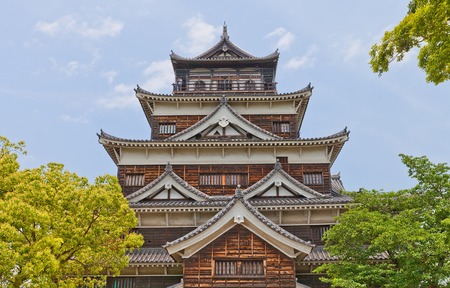 HIROSHIMA, JAPAN - MAY 20, 2015: Main keep of Hiroshima Castle (nickname Carp Castle)  in Hiroshima, Japan. National historic site, erected in 1591, destroyed by atomic bomb in 1945, reconstructed in 1958のeditorial素材