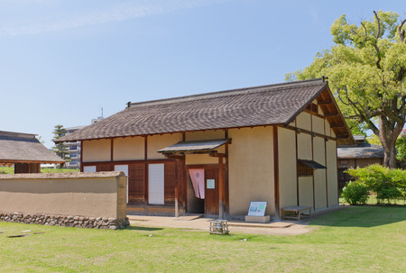 MATSUYAMA, JAPAN - MAY 21, 2015: First of two reconstructed samurai houses (Buke Yashiki) on the grounds of former Yuzuki castle in Dogo Park of Matsuyama, Shikoku, Japan. Yuzuki castle was erected in 1338, abandoned in XVI c.のeditorial素材