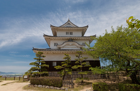 MARUGAME, JAPAN - MAY 22, 2015: Main keep (donjon, circa 1641) of Marugame castle, Shikoku Island, Japan. One of only twelve survived original castles in Japan, Important Cultural Propertyのeditorial素材