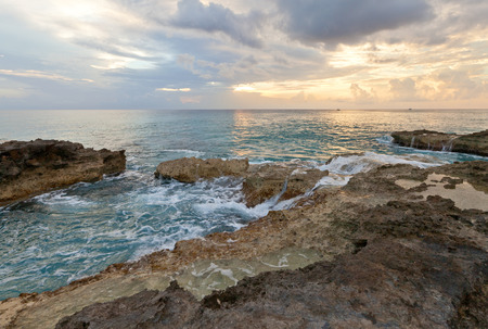 Summer sunset on the seashore of Grand Cayman Island, Cayman Islands, British Overseas Territoryの写真素材