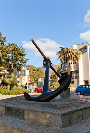 TIVAT, MONTENEGRO - DECEMBER 24, 2015: Monument with metal anchor in Tivat town, Montenegro. Commemorates 100 anniversary of local  Naval shipyard (Arsenal) in 1989のeditorial素材