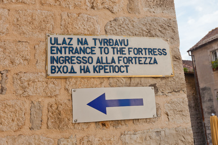 KOTOR, MONTENEGRO - JANUARY 02, 2016: Information plate pointing the entrance of the trial to the mountain fortress of St. John in Kotor , Montenegroのeditorial素材