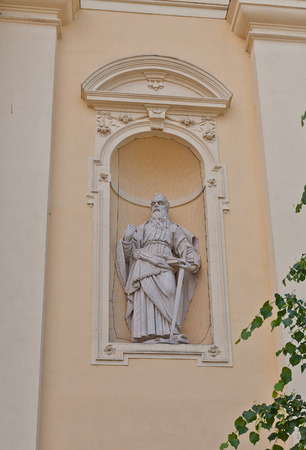 VALTICE, CZECH REPUBLIC - MAY 29, 2016: Statue of Saint Paul the Apostle on the facade of Church of the Annunciation of the Virgin Mary (circa 17th c.) in Valtice, Czech Republic.のeditorial素材