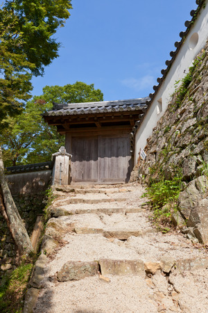 TAKAHASHI, JAPAN - JULY 20, 2016: East Gate of main bailey (honmaru) of Bitchu Matsuyama castle (17th c.), Takahashi, Japan. Matsuyama is one of only 12 survived castles in Japanのeditorial素材