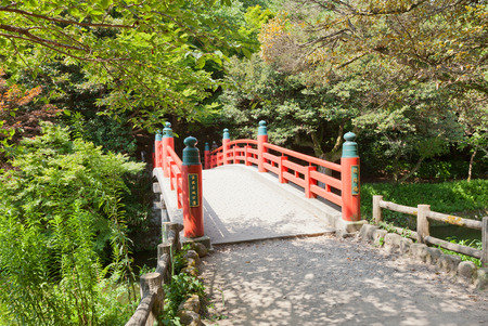 TAKAOKA, JAPAN - AUGUST 05, 2016: Vermilion lacquered bridge over the moat of the former Takaoka Castle in Takaoka, Japan. Castle was erected in 1609 but decommissioned already in 1615のeditorial素材