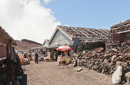 FUJI, JAPAN - AUGUST 09, 2016: Lodge house and small shops on the summit of Mount Fuji. Fuji is highest mountain in Japan at 3,776 m, symbol of Japan and UNESCO siteのeditorial素材
