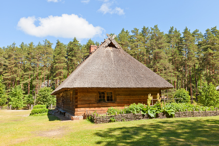 RIGA, LATVIA - JUNE 13, 2016: Dwelling rural house (circa 1848) of Veskerves farmstead of Kurzeme ethnic group. Exhibited in Ethnographic Open-Air Museum of Latvia since 2001のeditorial素材